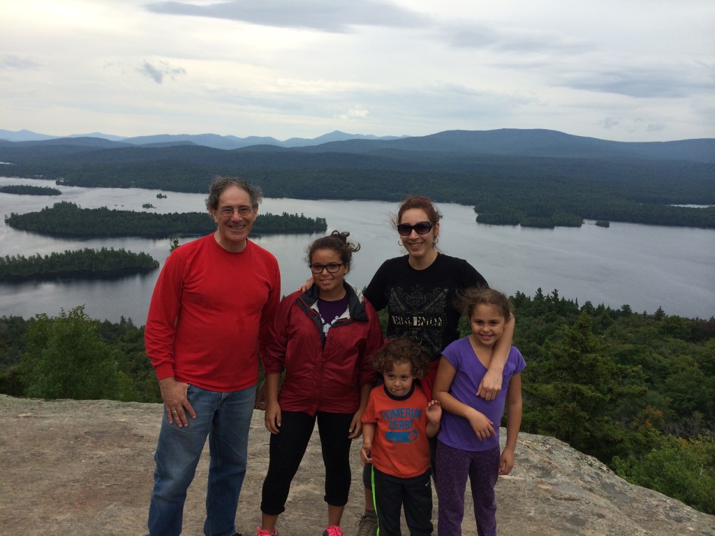 words are not enough: Adrian, Cara, and grandkids on the top of Castle Rock