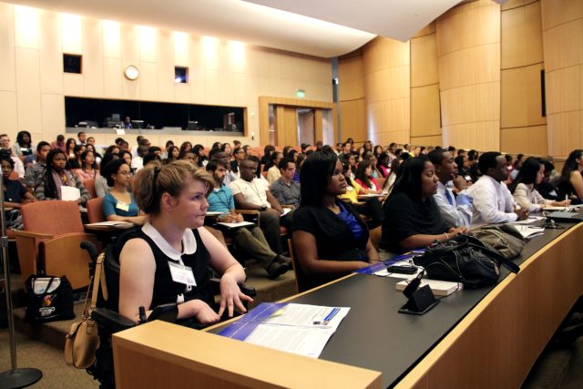 How well do 4-hour lectures work: photograph of a college classroom full of students staring forward toward the front of the room