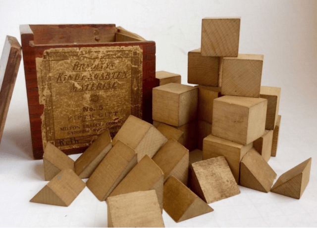 How I got here…a pile of old Froebel blocks used to immerse young children in play